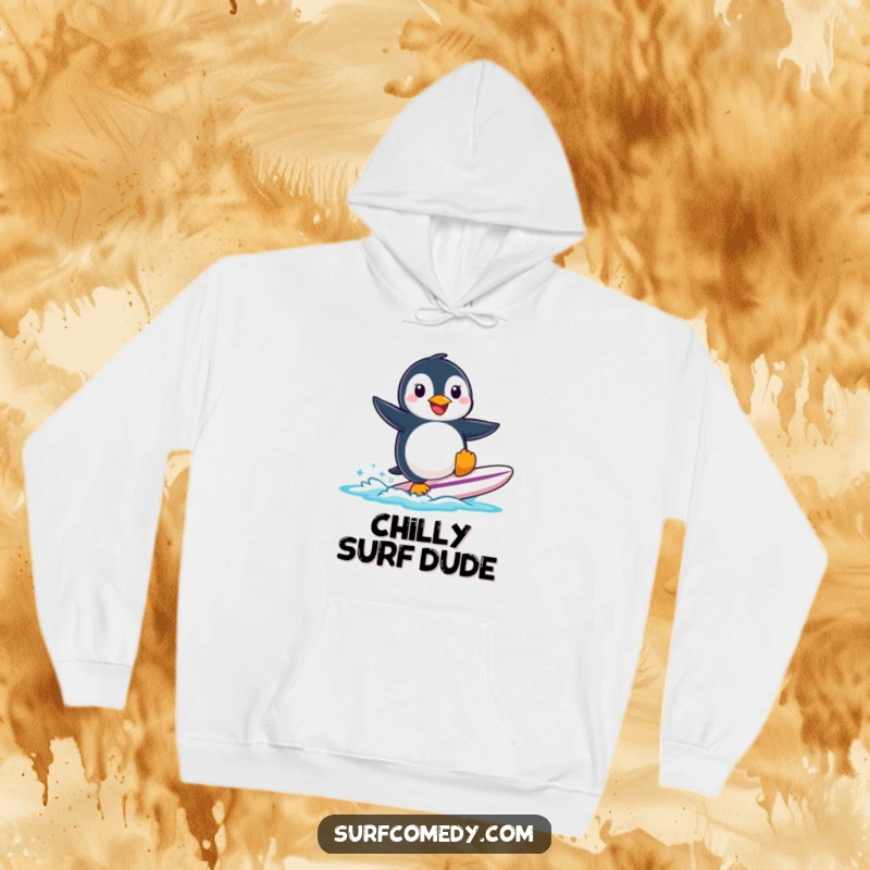 Funny smiling penguin character trying to surf a small surfboard, featured on a cozy and humorous hoodie.