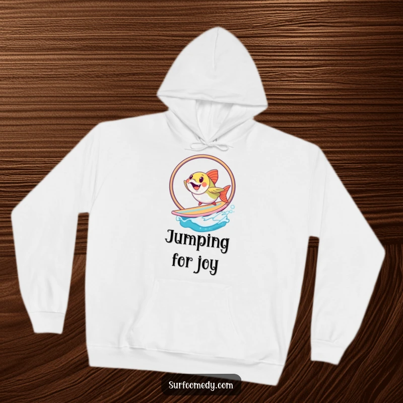Funny fish character in mid-hoop jump on a surfboard, captured on a cozy and humorous hoodie. Great funny gift.