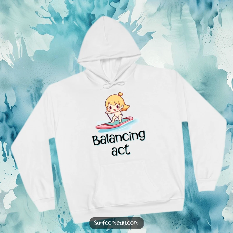 Funny Kawaii character precariously balancing on a paddleboard, featured on a warm and humorous hoodie.