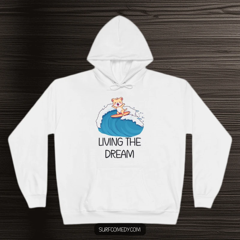 Funny and cozy hoodie depicting a happy animal character surfing a large wave on a surfboard, perfect for beach lovers.