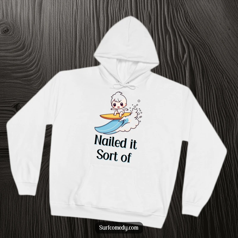Funny Kawaii character hoodie featuring a comical surfboard wipeout with a splash, a great funny gift idea.