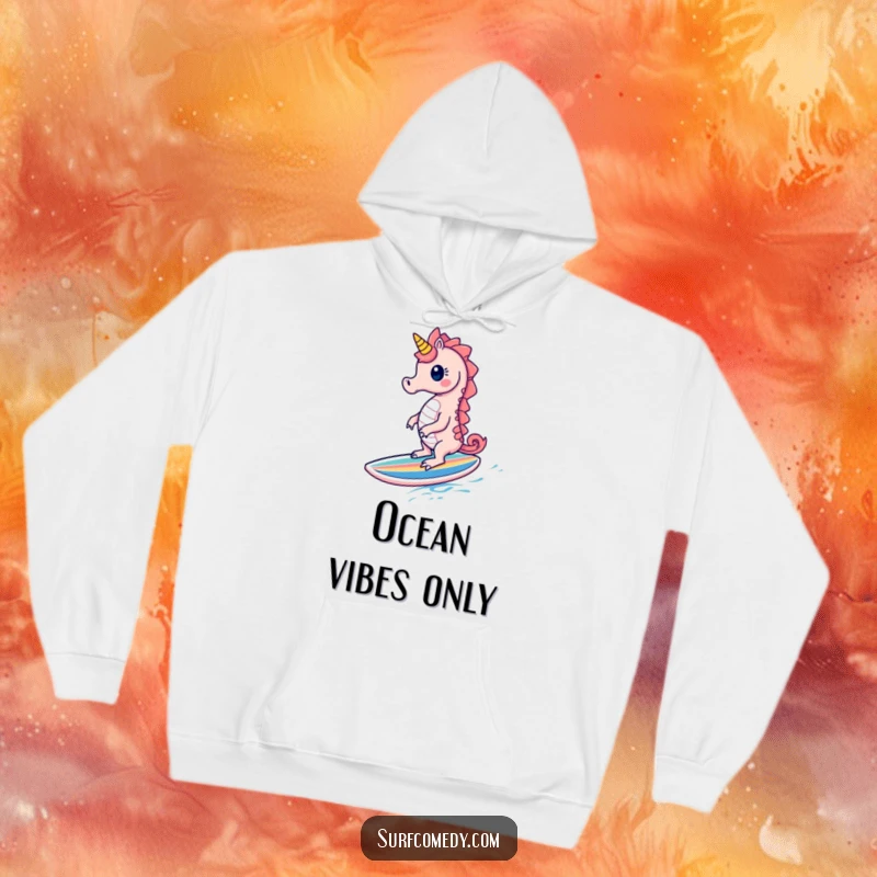 Funny Seahorse Hoodie: A cute seahorse character gleefully rides a tiny surfboard, offering cozy ocean-themed humor.