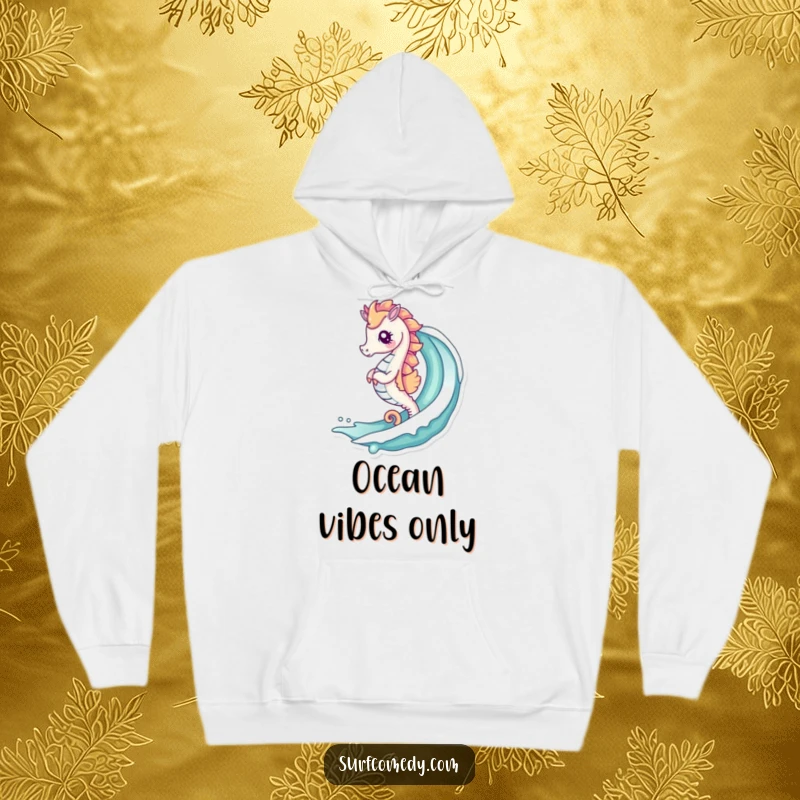 Funny hoodie featuring a cute kawaii seahorse skillfully surfing a curling ocean wave, offering warmth and seaside style.