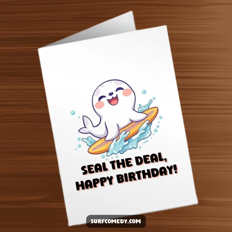 Funny Free Printable Birthday Card: Laughing seal joyfully sliding off a surfboard into a big splash.