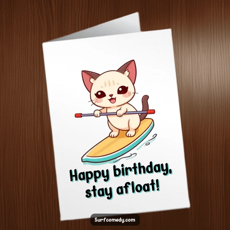 Funny Free Printable Birthday Card: Siamese cat happily balances on a paddleboard, looking unsteady but cheerful, for a birthday.