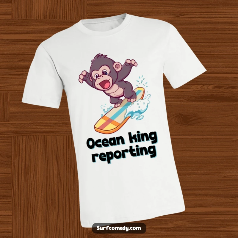 Funny t-shirt showing a joyful gorilla executing a playful dive from a surfboard into a vibrant blue ocean.