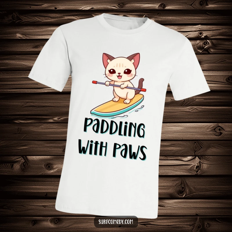 Funny Siamese cat playfully balancing unsteadily on a paddleboard on a t-shirt, showcasing happiness and water fun.